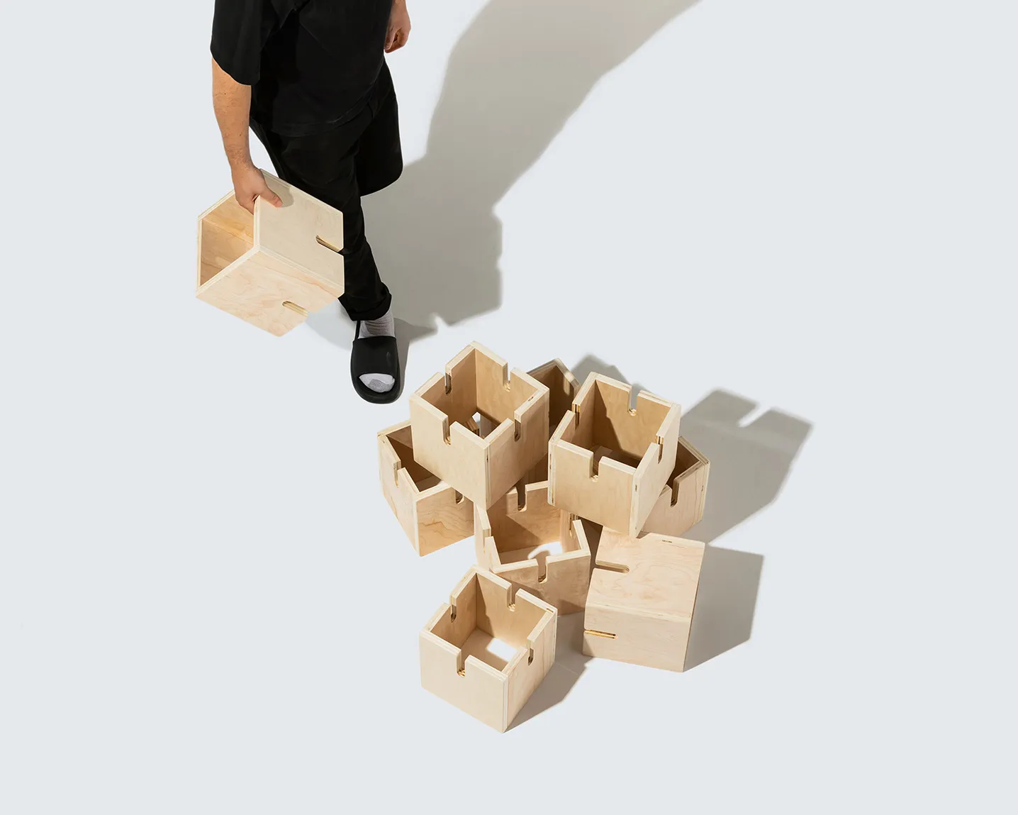 An arial view of the a person walking towards the Tic Tac Toe blocks  by Quagga Designs.