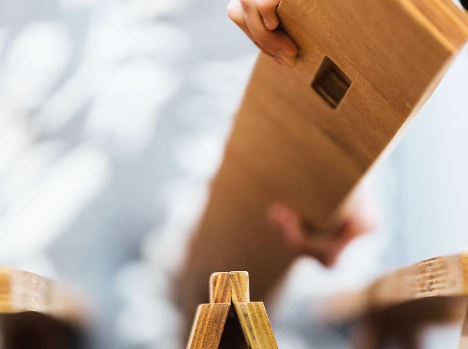 Close up of someone placing a Flex slat onto a Flex base bed.